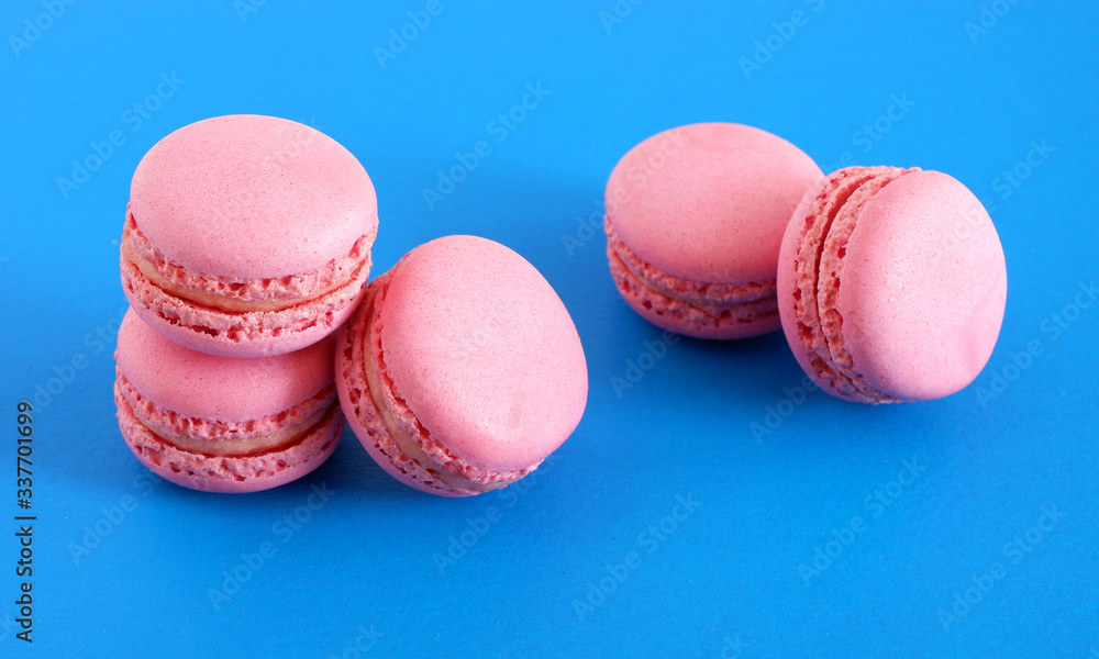 macaroons on a blue background. Sweets. macaroons on a blue background. Sweets.