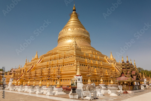 Golden Shwesandaw stupa under a blue sky  Bagan  Myanmar