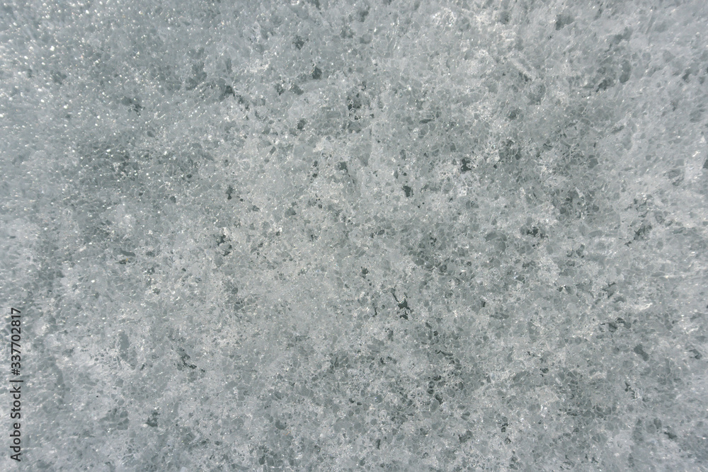 ice texture of snow. Ice surface with the original texture. frozen river, lake, winter ice texture of snow. Ice surface with the original texture. frozen river, lake, winter
