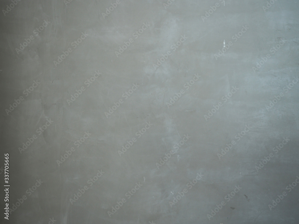 Fototapeta premium Texture of cement wall with scratches and stains as a retro pattern wall.Concept is wall banner,decorate,abstract background,construction.