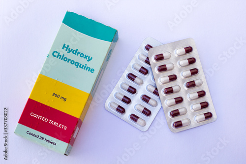 Medical Concept - Hydroxychloroquine  cloroquina  medicine box with pills on white background photo