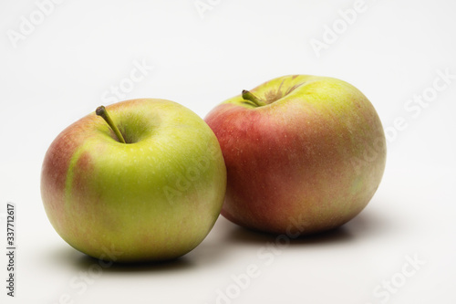 A ripe Apple shot from the side on a white background