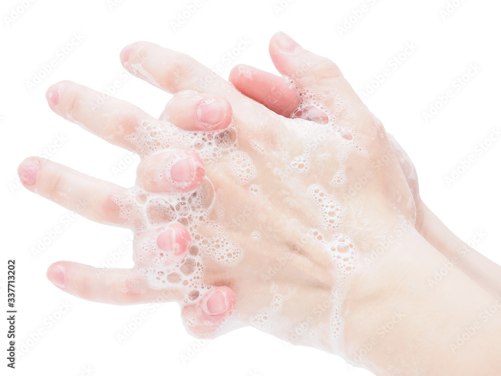Thorough hand washing with soap and disinfectant solution on a white background, close-up. Protection and precautions against viruses in an epidemic. Concept: disease prevention