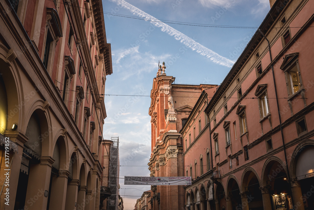 Town houses with Cathedral of Saint Peter in historic part of Bologna, Italy
