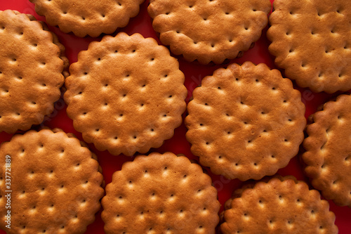 biscuits closeup on red background