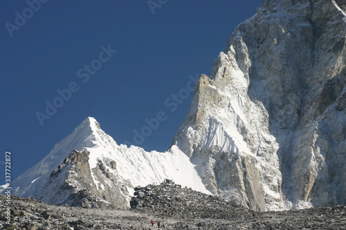 Trekkers at the top of Mount Kala Pattar , Nepal photo