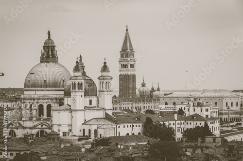Aerial vintage view of Basilica della Salute and San Marco bell tower, Venice, Italy