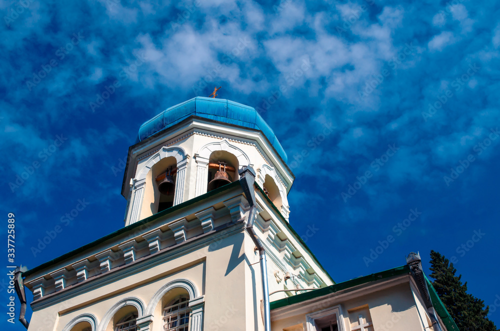 christian orthodox church on a background of sky with clouds