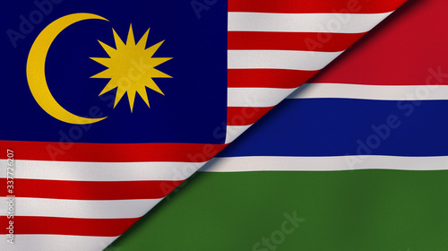 The flags of Malaysia and Gambia. News, reportage, business background. 3d illustration