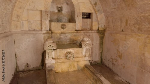 Mardin, Turkey - January 2020: Fountain inside Sehidiye mosque courtyard photo