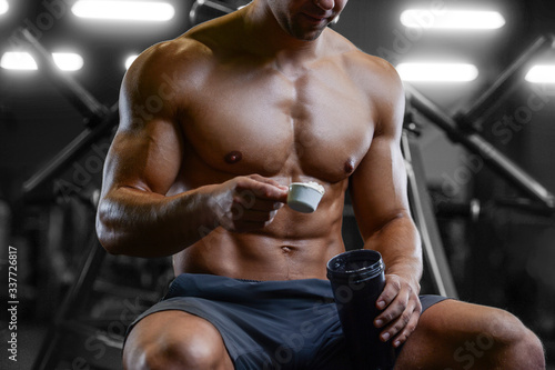 Bodybuilder protein powder after fitness workout