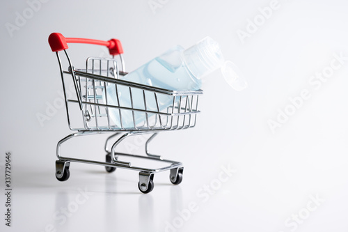 Alcohol spray, hand sanitizer gel for prevention germ and coronavirus vaccine in trolley, cart shopping online © PhotobyTawat