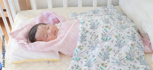 It is a picture of a one month old baby.