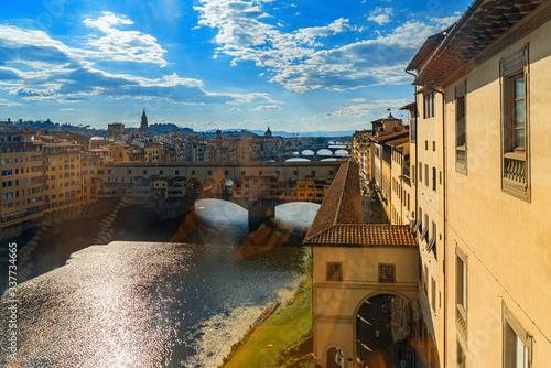 Beautiful view of the Florence cityscape from Uffizi Museum with Arno river,  Ponte Vecchio, Ponte Santa Trinita, Ponte alla Carraia, Ponte Amerigo Vespucci and Ponte alla Vittoria in Florence Italy photo