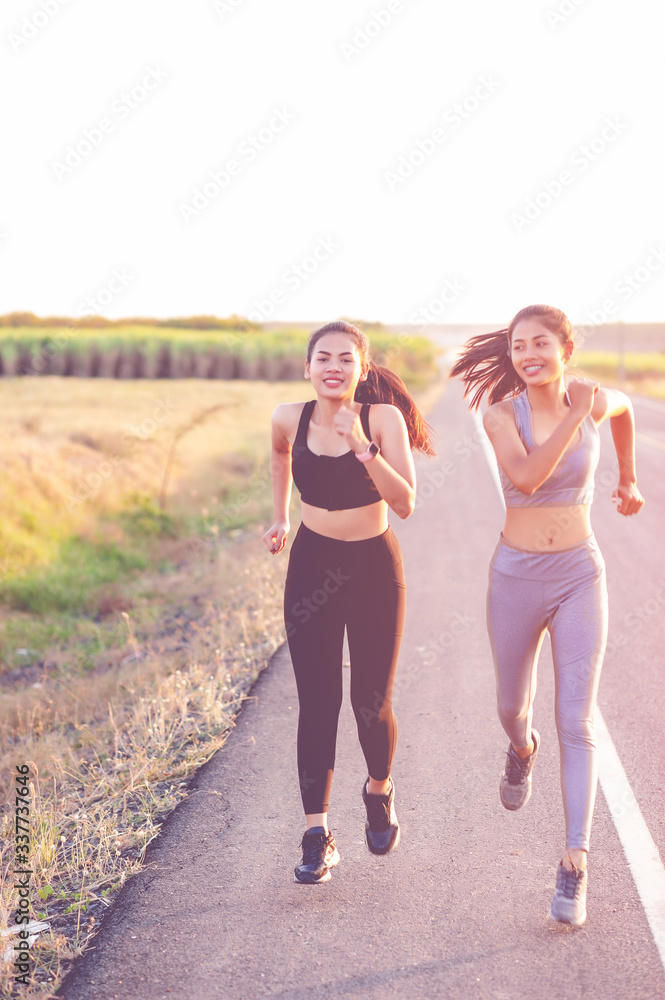 Women exercise happily for good health. Exercise concept Women exercise happily for good health. Exercise concept