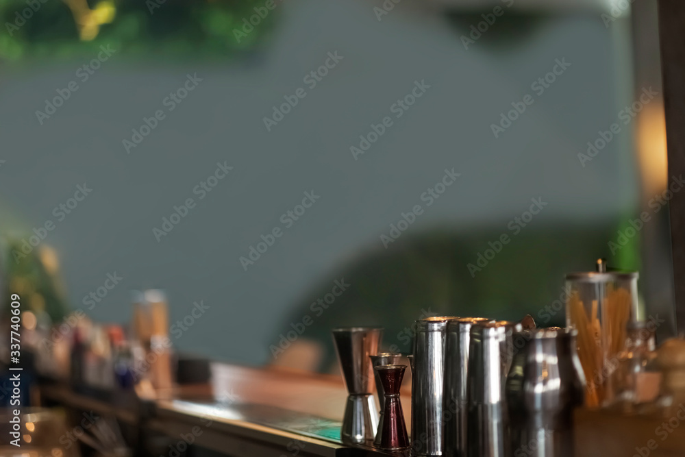 Close up view on wooden bar counter, blurred background Close up view on wooden bar counter, blurred background