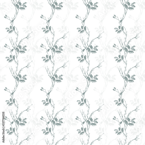 Seamless pattern of gray and dark gray vertical branches with leaves on a white background.