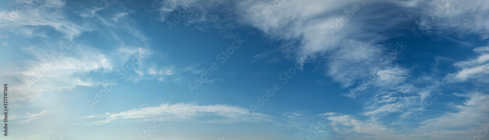 Panorama sky with beautiful cloud on a sunny day. Panoramic high resolution image.