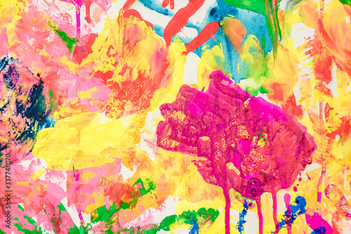 Colorful painted hand prints on white background