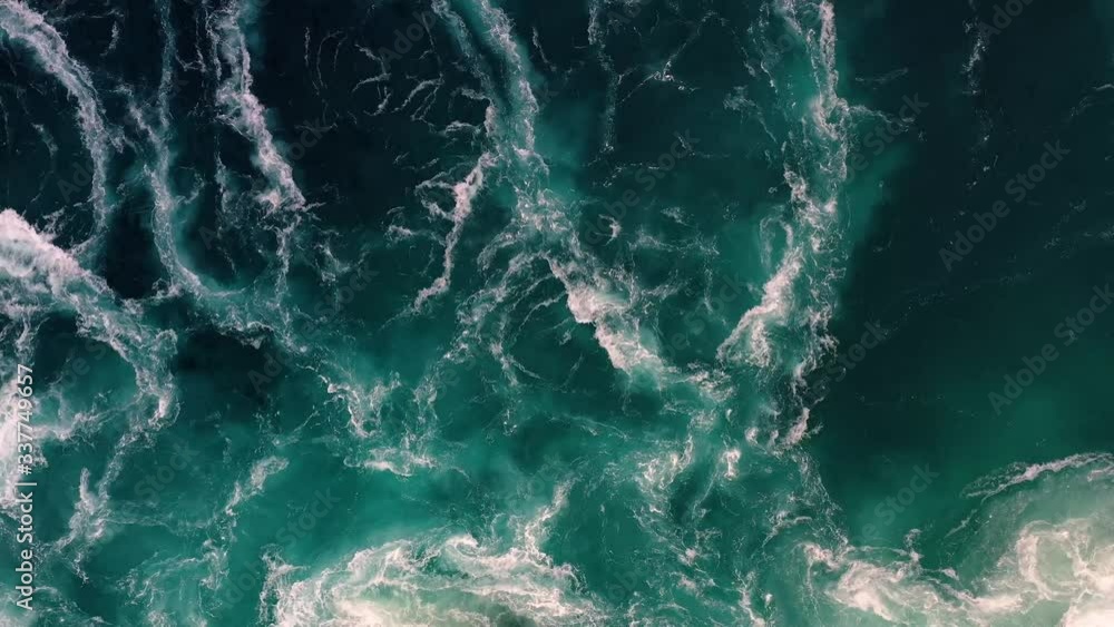 Waves of water of the river and the sea meet each other during high tide and low tide. Waves of water of the river and the sea meet each other during high tide and low tide.