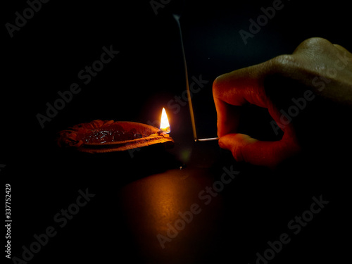 Canvas Print lamp and inscense sticks as an offering to god for worshipIndian Peacock Dancing