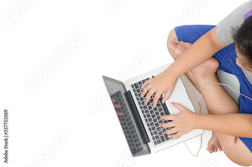 boy student playing computer with headsets and enjoy online learning top view