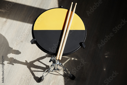 Drum practice pad and drumsticks. Drummer.