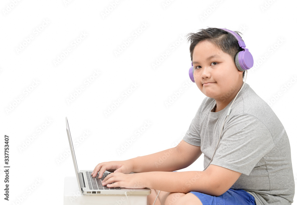 Obese boy student wear headphone study online with teacher isolated Obese boy student wear headphone study online with teacher isolated