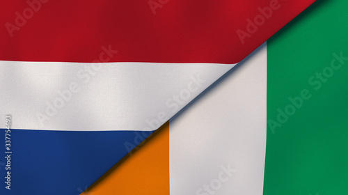 The flags of Netherlands and Ivory Coast. News, reportage, business background. 3d illustration photo