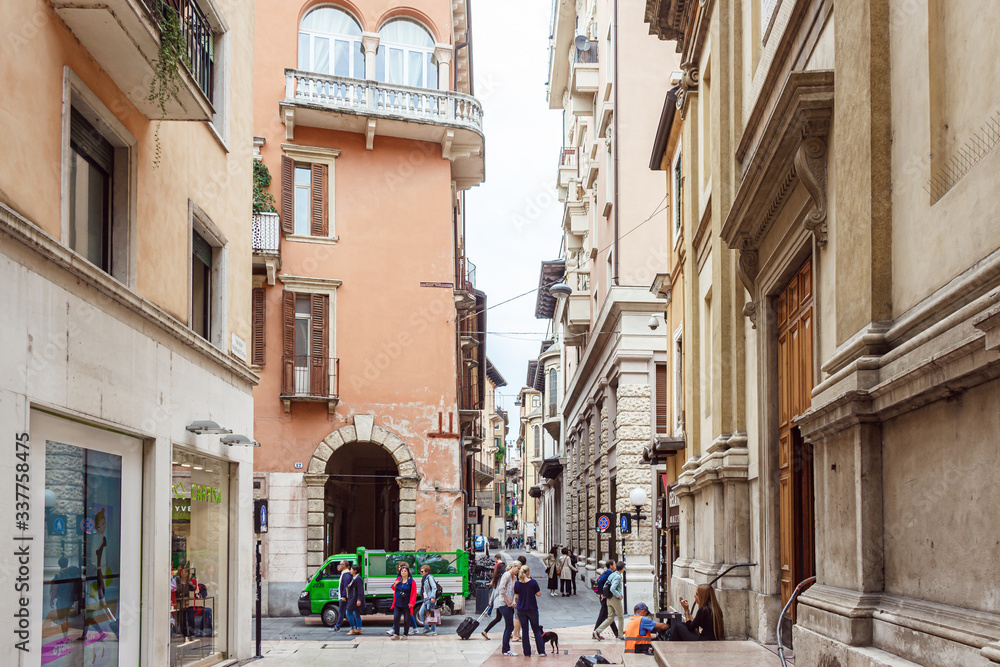 The architecture of the old part of the city of Verona in Italy. The Vicolo Samaritana street.
