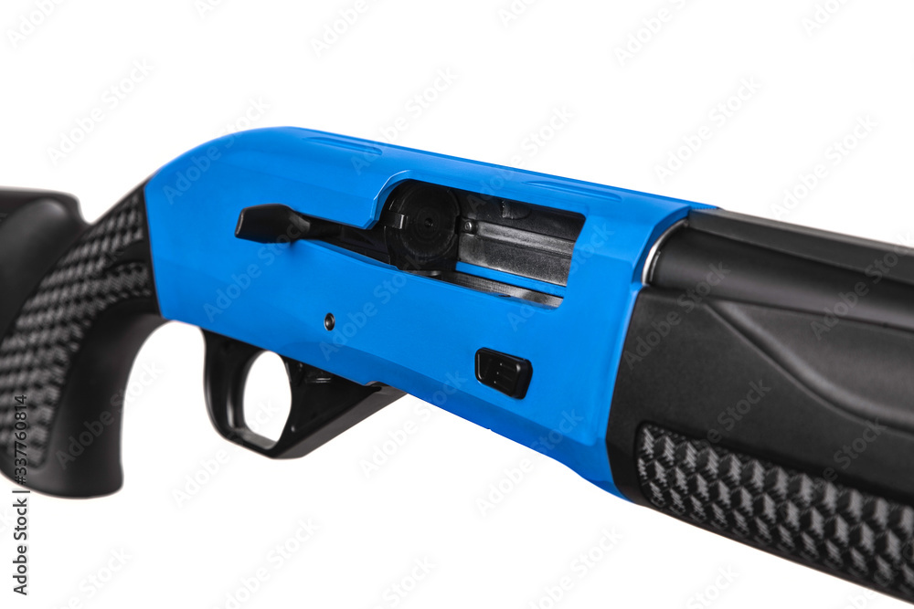 Modern black semi-automatic shotgun with blue accents isolate on a white back. Weapons for sport and hunting.