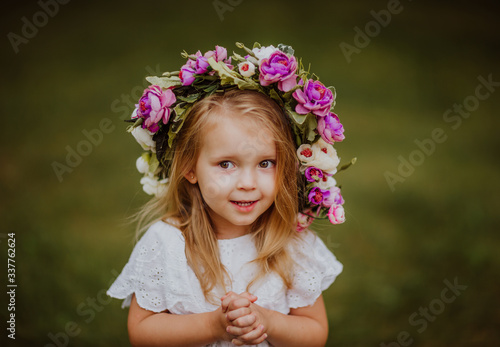 portrait of a little girl with flowers