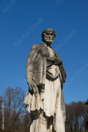 Soft stone statue exposed at Parco Querini, the largest public park in the city of Vicenza. The sculpture probably represents a philosopher from classical Greece and was made between 1600 and 1700