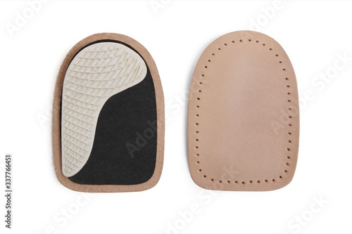 Orthopedic silicone heel pad from corns for the correction of different lengths of legs isolated on white background. Silicone insert for the forefoot. Insole. Silicone thumb protector with interdigit