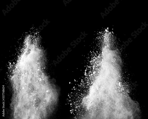 Fototapeta Naklejka Na Ścianę i Meble -  Explosion of white powder isolated on black background. Abstract colored background. holi festival.