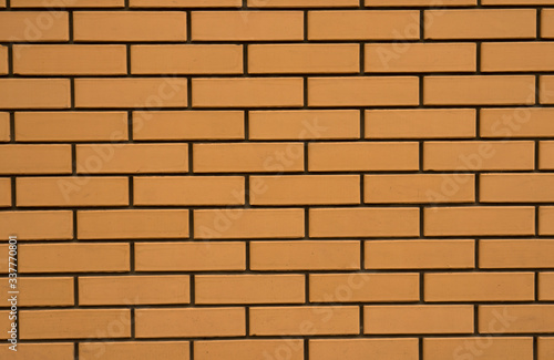 Brick wall texture. Yellow decorative brick.