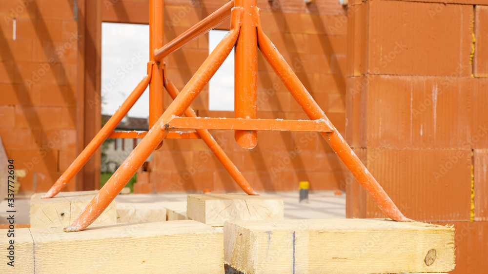 Design of a house during construction, close up on the scaffolding
Design of a house during construction, close up on the scaffolding