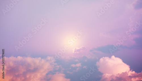 pastel sky clouds and sun