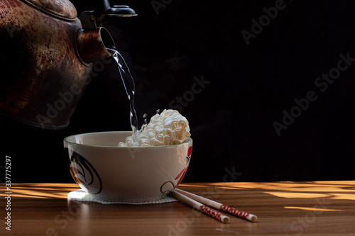 Canvas Print Instant noodles are a popular food because they are inexpensive and convenient,But high in sodium,If eaten in large quantities and continuously can negatively affect health,Unhealthy food concepts