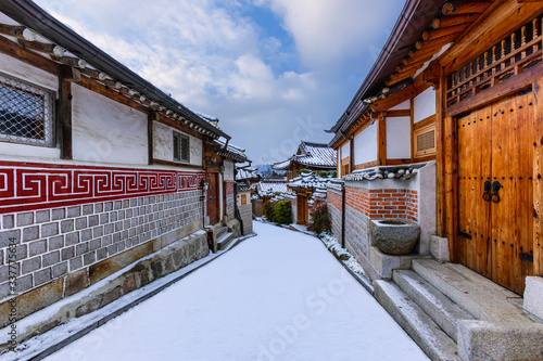 Winter and snow at Bukchon Hanok Village best landmark in Seoul, South Korea. photo