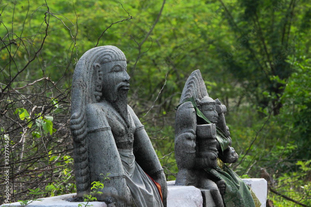Statue of hindu god and goddess in a rural temple in india Statue of hindu god and goddess in a rural temple in india