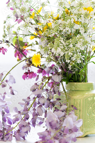 Arranging wildflowers  colorful blossom flowers  seasonal floral themes