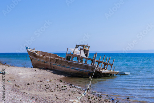 Tadjoura  Djibouti - November 09  2019  Palms and Boats on the Sea Coastline under Blue sky