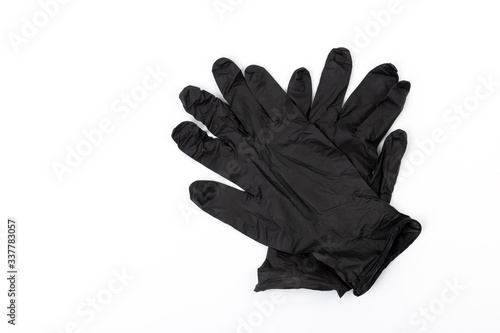 Black medical gloves isolated on white