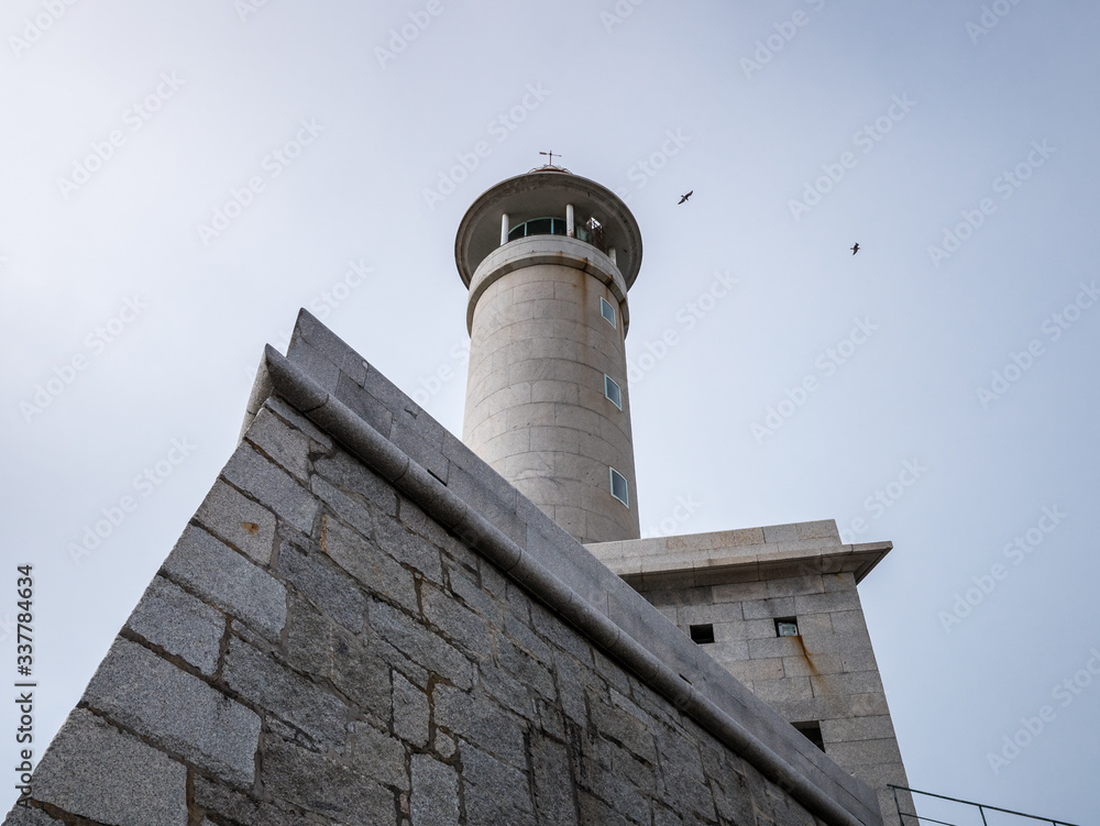 Looking up to Lighthouse of Punta Nariga, Death Coast, Galicia, Spain Looking up to Lighthouse of Punta Nariga, Death Coast, Galicia, Spain
