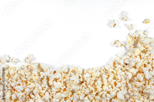 A pile of tasty popcorn, with copy space Isolated on white background. View from above.