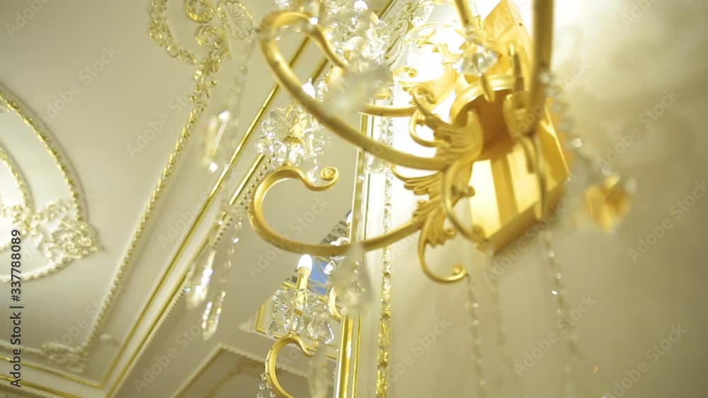 A beautiful Chandelier at a Restaurant. Could also be the Interior of a classy Bar or a Living Room. A beautiful Chandelier at a Restaurant. Could also be the Interior of a classy Bar or a Living Room.