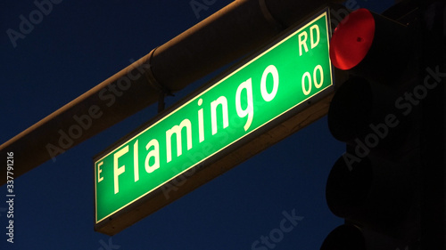 Flamingo Road street sign at Las Vegas Boulevard - evening view - USA 2017