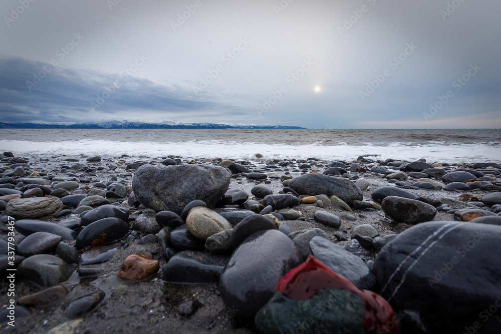 rocks on the beach at sunset rocks on the beach at sunset