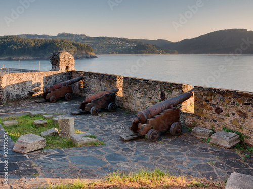 Cannons and merlons of the fortress Castillo de la Concepción in Cedeira, Rías Altas, La Coruña, Spain